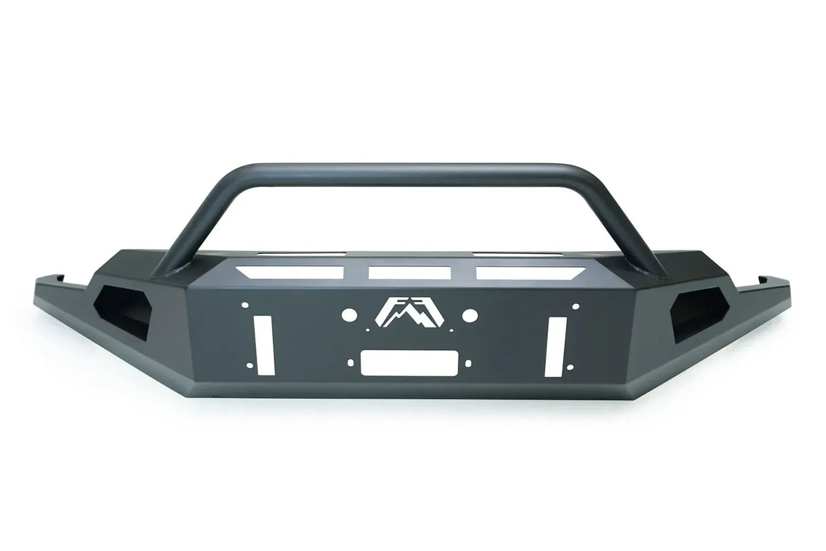 Fab Fours Red Steel front bumper for 2019+ GMC Sierra 1500 in matte black, angled view showing the tubular pre-runner guard, winch fairlead opening, light cutouts and Fab Fours logo on a white background