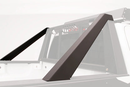 Render of Fab Fours headache rack modifier braces mounted on the bed rails of a white mid-size truck, with the headache rack and cab shown ghosted