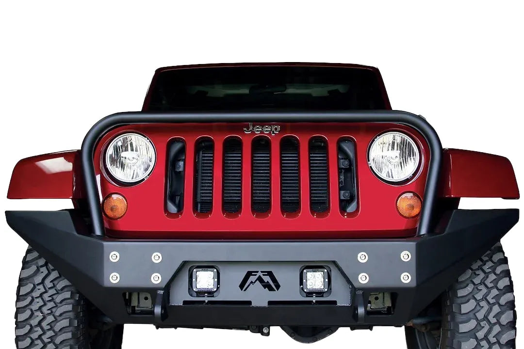 Fab Fours Full Metal Jacket full-width front bumper with full guard on a red Jeep Wrangler JK, straight-on front view, showing the tubular grille hoop, cube lights and bolted face plate
