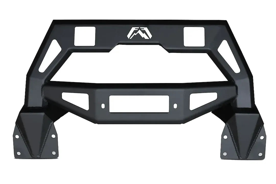 Black Fab Fours FMJ winch modifier, front view on a white background, showing the winch plate, cube light openings, and Fab Fours logo