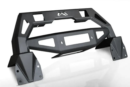 Black Fab Fours FMJ winch modifier with winch plate cutout, cube light openings, and bolt-on mounting brackets, angled view on a white background