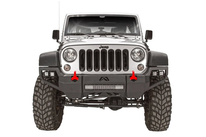 Fab Fours Vengeance front bumper on a silver Jeep Wrangler JK Rubicon, straight-on front view, showing the center light bar, corner pod lights and red shackles