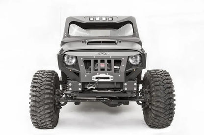 Fab Fours front steel fenders on a lifted black Jeep Wrangler JK, front view, with Fab Fours grille guard, winch, and cowl light bar