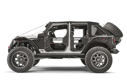 Fab Fours full tube doors on a Jeep Wrangler JK Unlimited, passenger-side view, showing the front and rear tube doors with steel lower panels, padded upper frames, paddle latches and Fab Fours logos