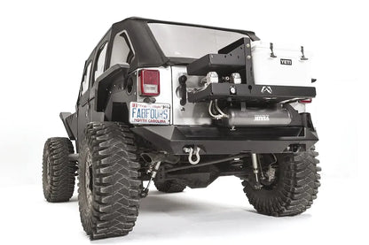 Fab Fours air compressor and cooler mount on a Jeep Wrangler JK, rear driver-side view, showing the dual Viair compressors, air tank and Yeti cooler on the tire carrier