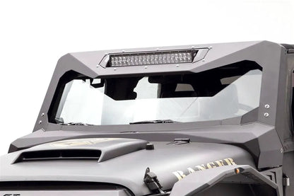 Fab Fours ViCowl Light Bar Insert Mount on a matte gray Jeep Wrangler JK, driver-side view, holding a 20-inch LED light bar in the top of the steel windshield cowl