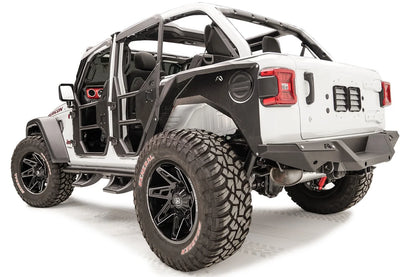 Fab Fours rear steel fender on a lifted white Jeep Wrangler JL Rubicon with tube doors, driver-side rear three-quarter view, with Fab Fours rear bumper