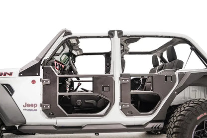 Fab Fours half tube doors on a white Jeep Wrangler JL, driver-side profile view, showing front and rear tube doors, steel lower panels and door hinges