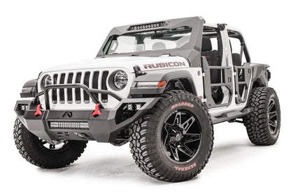 Fab Fours Vengeance front bumper with pre-runner guard on a white Jeep Wrangler JL, driver-side front three-quarter view, showing the tube hoop, LED light bar and red tow hooks