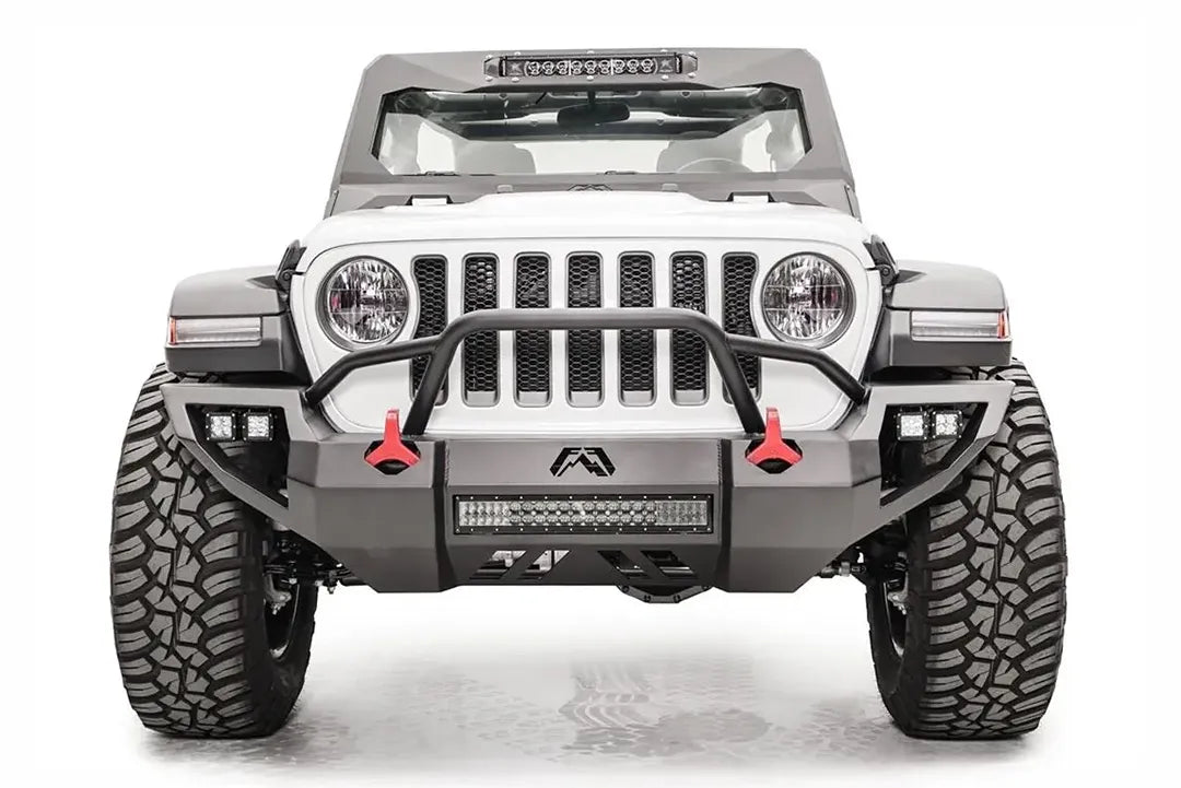 Fab Fours Vengeance front bumper with pre-runner guard on a white Jeep Wrangler JL, straight-on front view, showing the tube hoop, center LED light bar and red tow hooks
