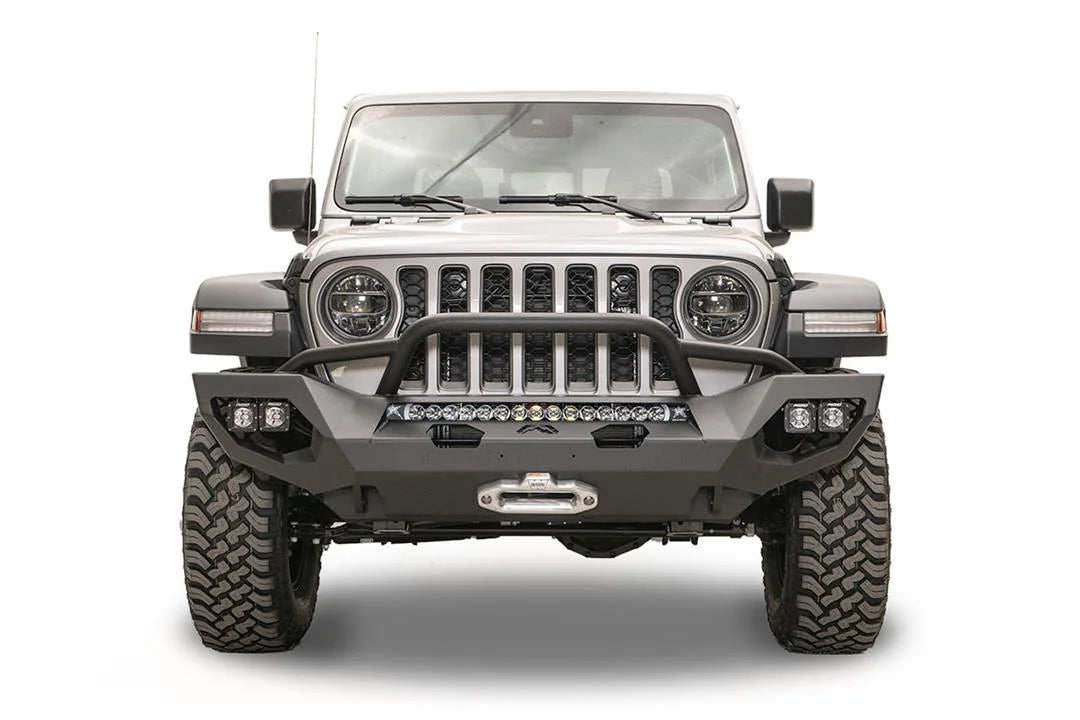 Fab Fours Matrix front bumper with pre-runner guard on a silver Jeep Gladiator JT, straight-on front view, showing the tube hoop, center LED light bar and winch fairlead