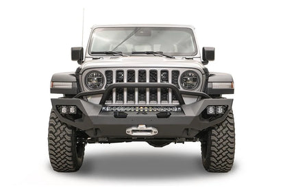 Fab Fours Matrix front bumper with pre-runner guard on a silver Jeep Gladiator JT, straight-on front view, showing the tube hoop, center LED light bar and winch fairlead