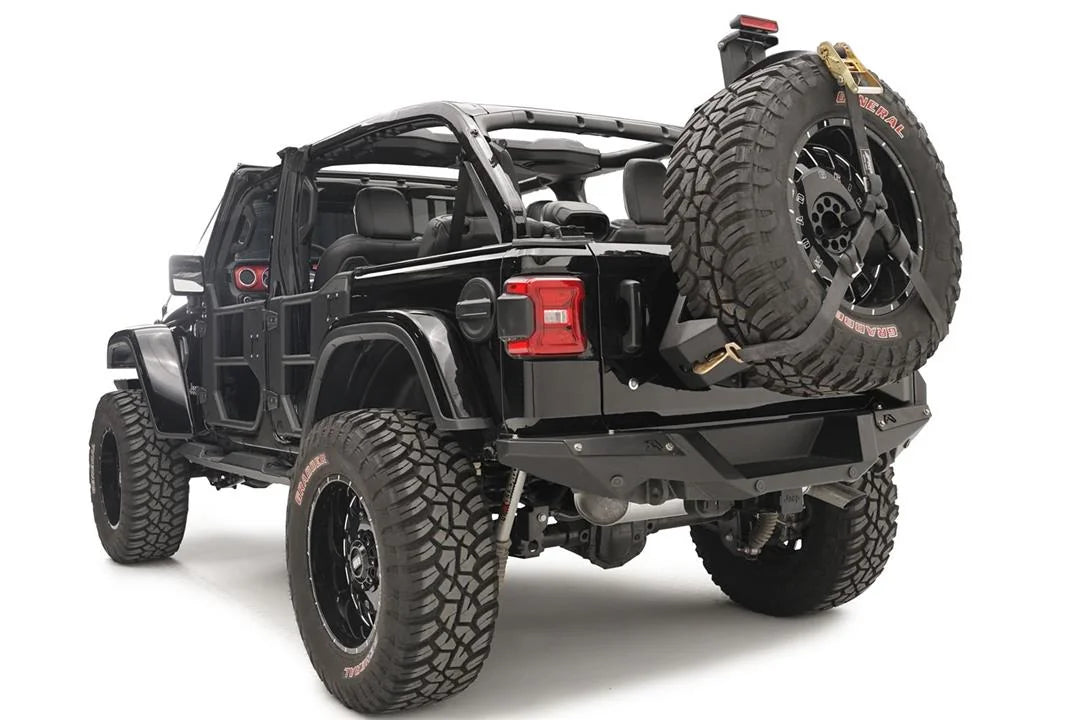 Fab Fours spare tire carrier on a black Jeep Wrangler JL, rear driver-side view