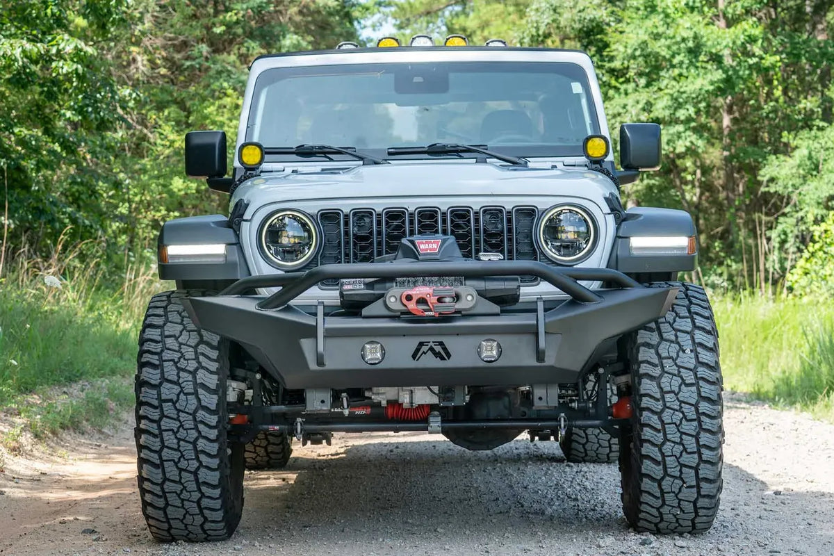 Fab Fours Premium front Lifestyle bumper on a Jeep Wrangler JL, outdoor view