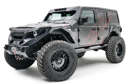 Fab Fours front fenders with gill vents on a lifted black Jeep Wrangler JL Unlimited, driver-side front three-quarter view, with Fab Fours winch bumper and cowl armor