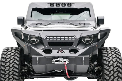 Fab Fours front fenders with amber marker lights on a lifted black Jeep Wrangler JL, front view, with Fab Fours winch bumper, Warn winch, and cowl light bar