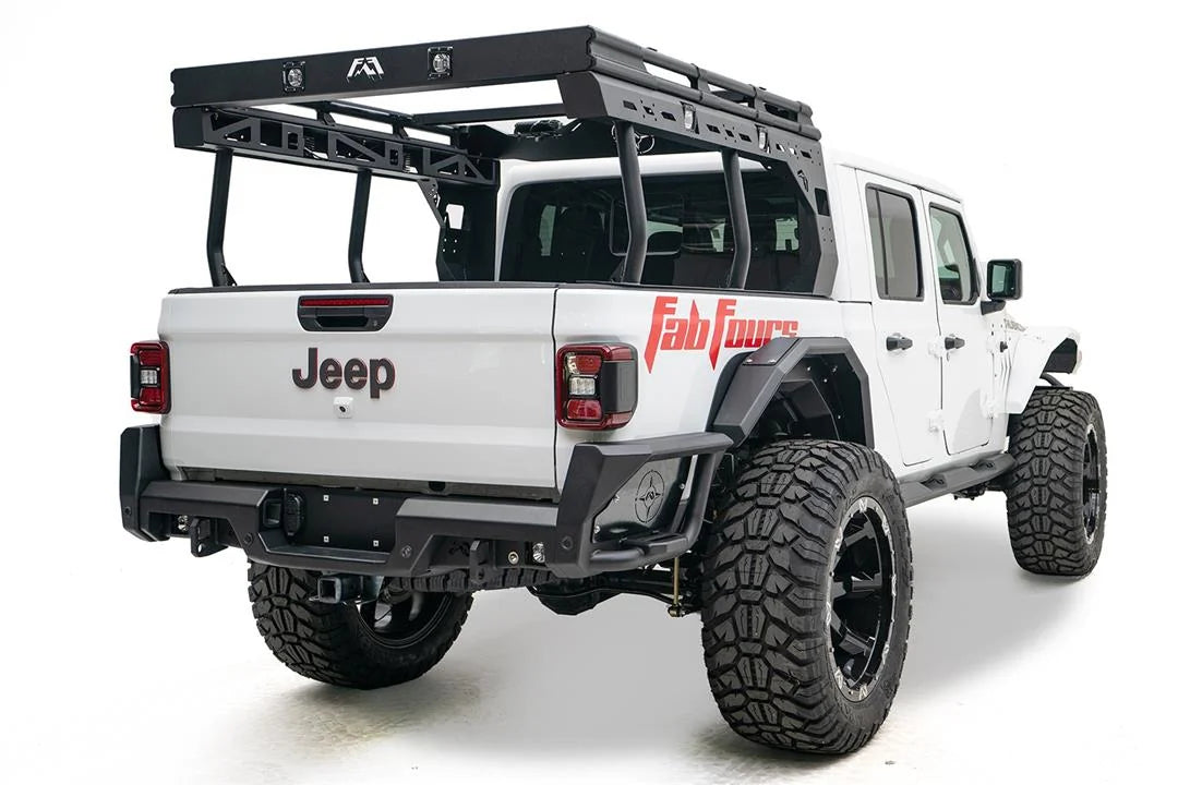 Lifted white Jeep Gladiator with Fab Fours rear bumper, rear three-quarter view