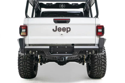 Fab Fours rear bumper on a white Jeep Gladiator, straight rear view
