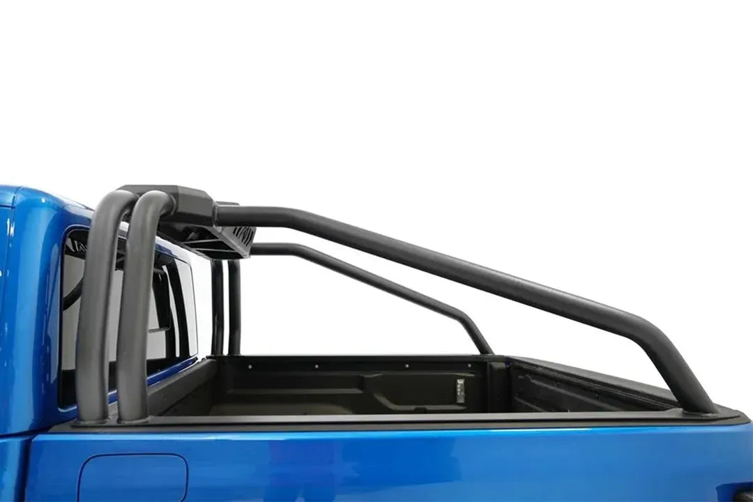 Fab Fours sport rack over the bed of a blue Jeep Gladiator, driver-side view