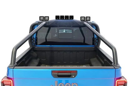 Fab Fours sport rack with cube lights mounted on top, over the bed of a blue Jeep Gladiator, rear view
