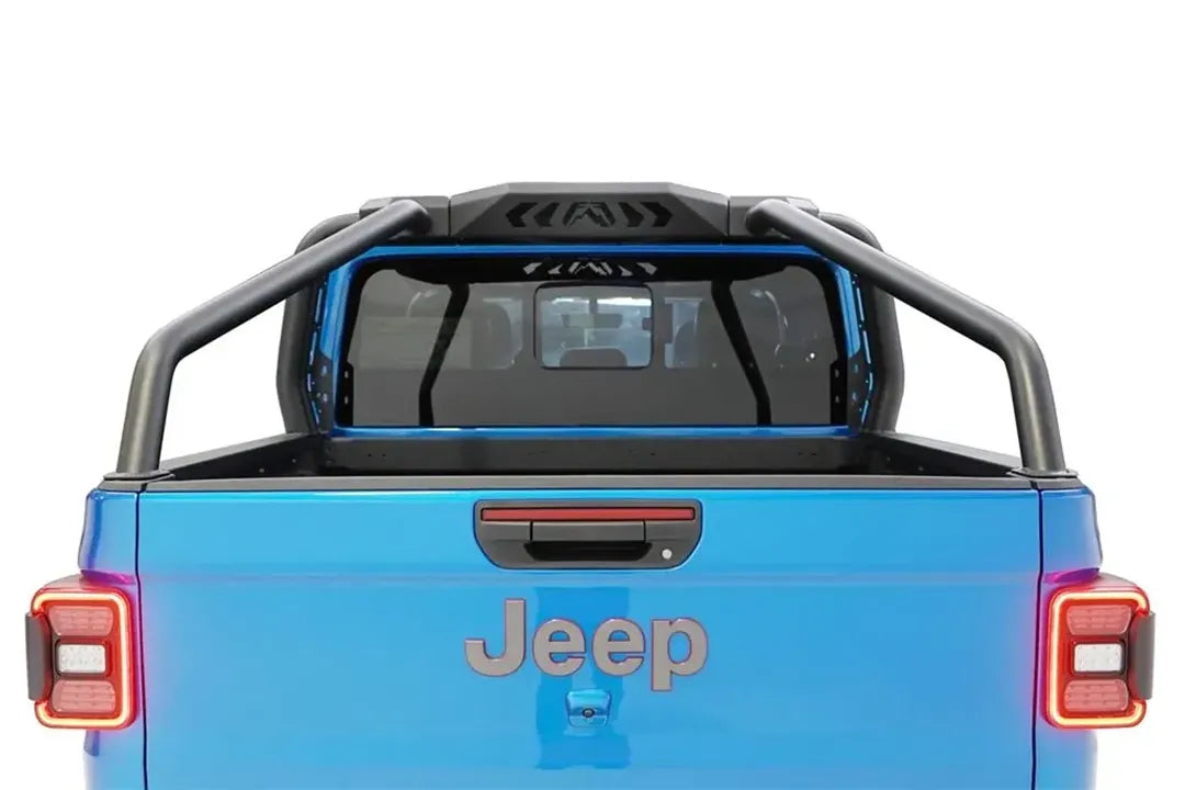 Fab Fours sport rack over the bed of a blue Jeep Gladiator, straight rear view of the center panel with Fab Fours logo cutouts