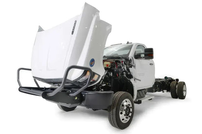 Fab Fours winch mount on a white Chevrolet Silverado 4500 chassis cab, driver-side front three-quarter view with hood open, showing the tube guard, winch mount and steel base