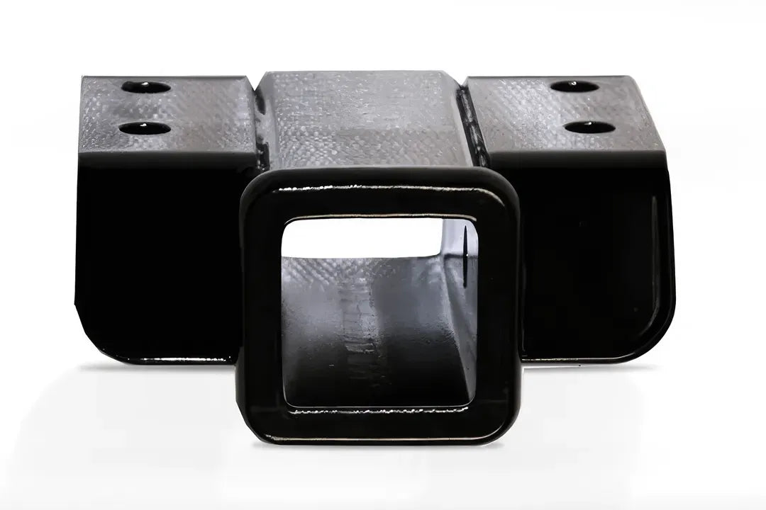 Fab Fours 2-inch receiver hitch in gloss black, front view showing the square receiver opening with a reinforced collar and two side mounting plates with bolt holes on a white background