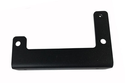 Fab Fours sensor relocation bracket for the Ford F-150, angled top view, showing the notched mounting arms, bolt holes and the welded nut on the upright tab