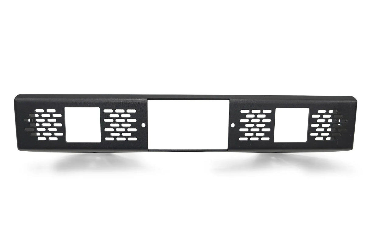 Fab Fours adaptive cruise control relocation bracket for the Ford Bronco Vengeance bumper, matte black steel center panel with a large sensor opening, two square light cutouts and slotted vents on a white background