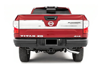 Fab Fours Elite rear bumper on a red Nissan Titan XD