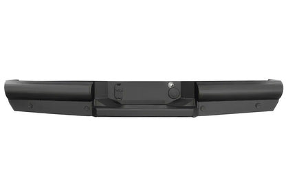 Fab Fours Black Steel Elite Rear Bumper for Nissan Titan XD, rear view showing the ranch-style pipe end sections, back-up sensor holes and center license plate and hitch area on a white background