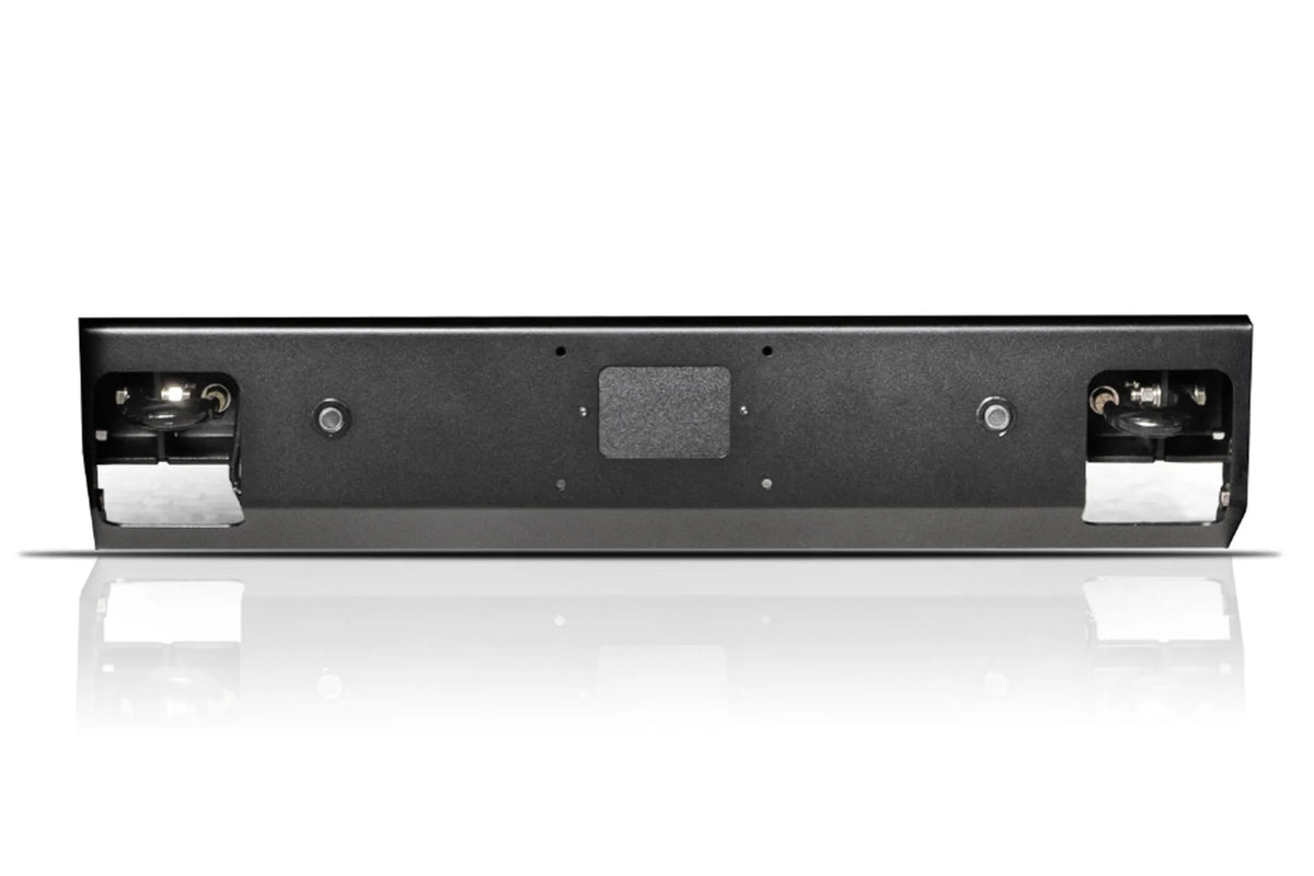 Fab Fours Elite replacement lower guard for the Ford Super Duty in black powder coat, straight-on front view, showing the solid face with parking sensor openings, a center badge mount and shackle mount openings at each end