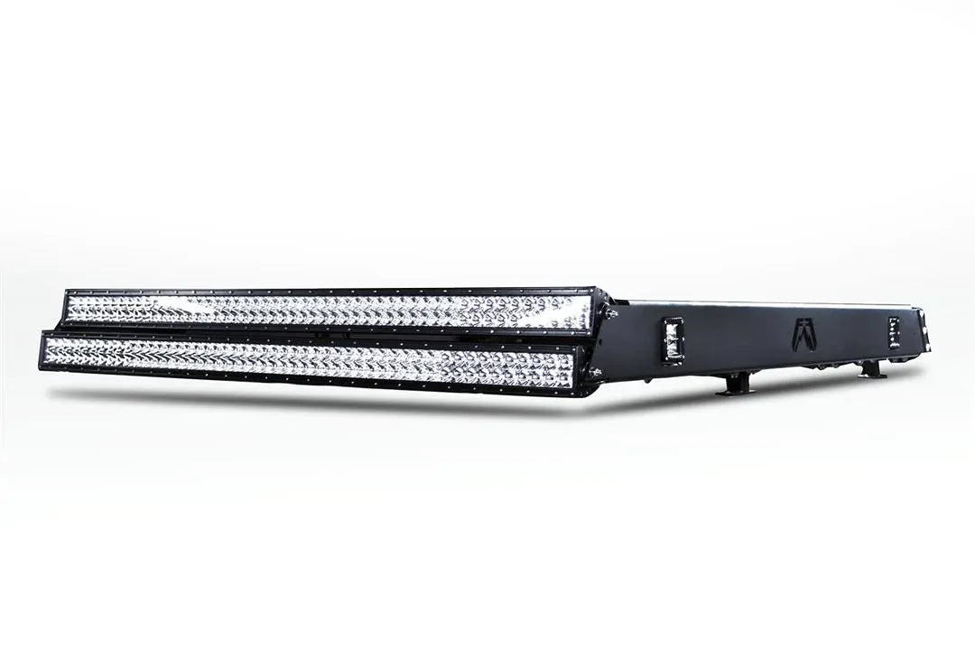 Fab Fours roof rack in black powder coat, low angled view, showing the slim rack profile with front-mounted light bars and cube lights