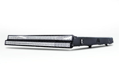 Fab Fours roof rack in black powder coat, low angled view, showing the slim rack profile with front-mounted light bars and cube lights