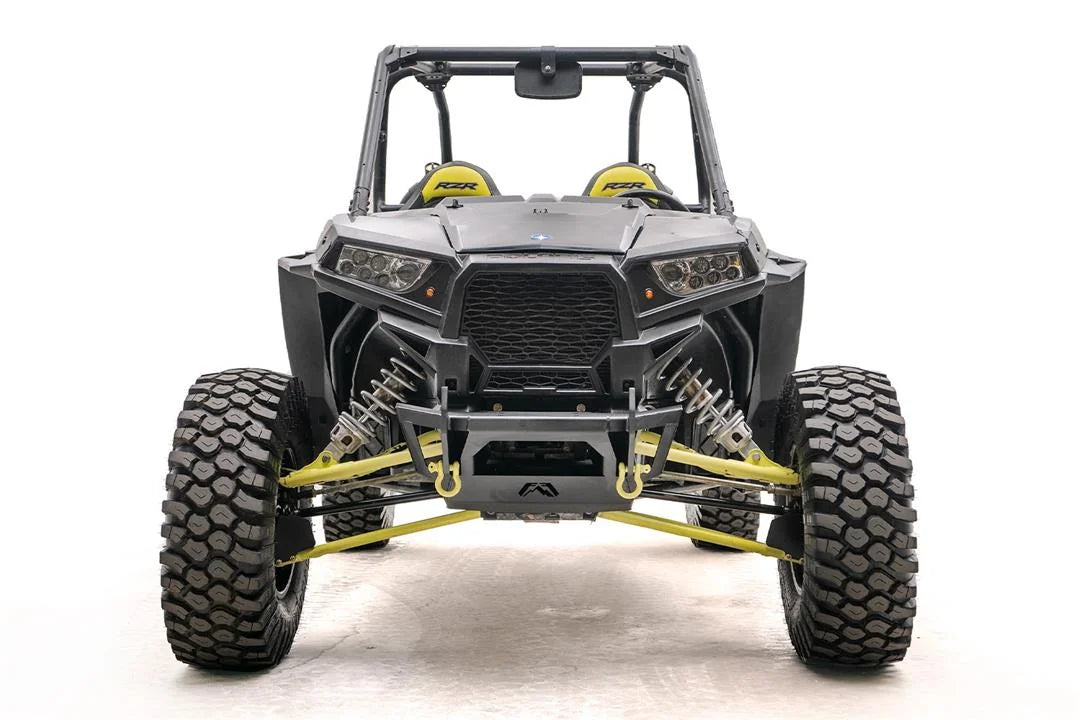 Fab Fours SxS winch bumper on a gray Polaris RZR XP with yellow accents, front view, without winch installed, with yellow D-ring shackles