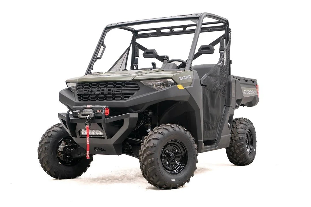 Fab Fours SxS winch bumper on a green Polaris Ranger 1000, driver-side front three-quarter view, with Warn Axon winch and LED light bar