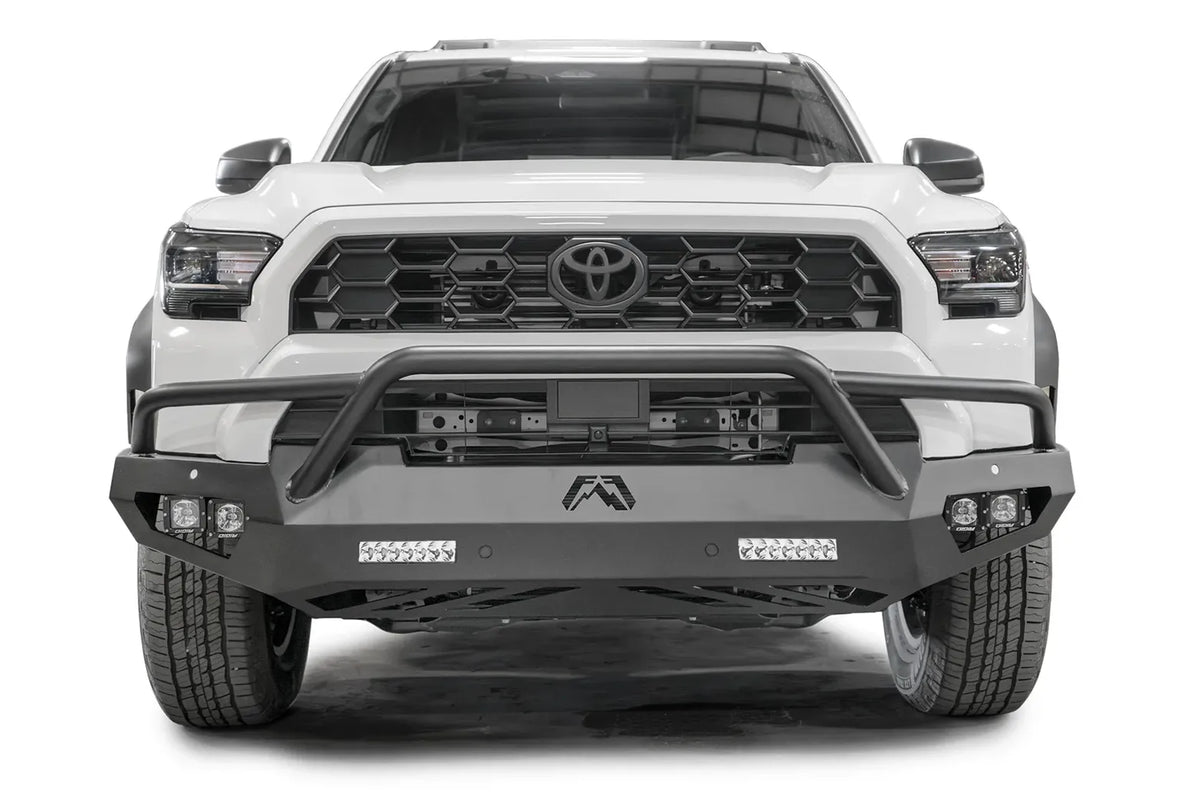 Fab Fours Vengeance front sensor bumper with pre-runner guard on a white Toyota 4Runner, straight-on front view, showing the tube hoop, LED light bars and cube lights