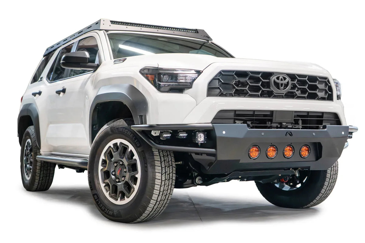 Fab Fours Ultra Light Front Bumper with no guard on a white 2025 Toyota 4Runner, front passenger-side view