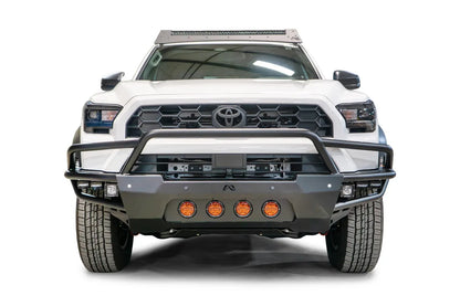 Fab Fours Ultra Light Front Bumper with guard on a white 2025 Toyota 4Runner, front view showing the full-width tubular guard