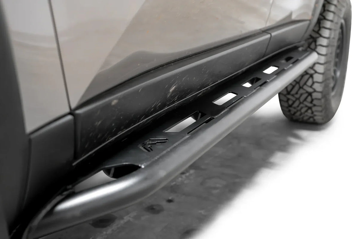 Close-up of the Fab Fours Rock Step slider on a Toyota Land Cruiser