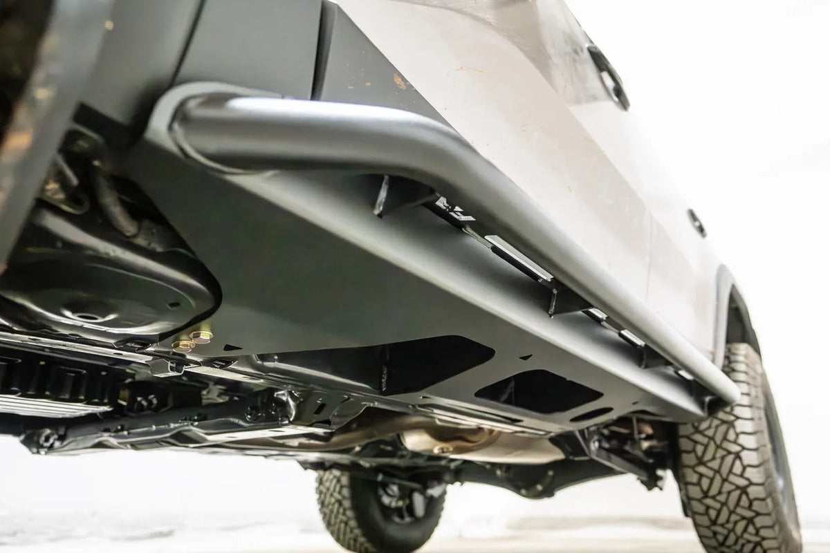 Underside view of the Fab Fours Rock Step slider on a Toyota Land Cruiser