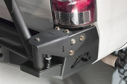 Close-up of the Fab Fours spare tire carrier hinge on a Toyota Tacoma