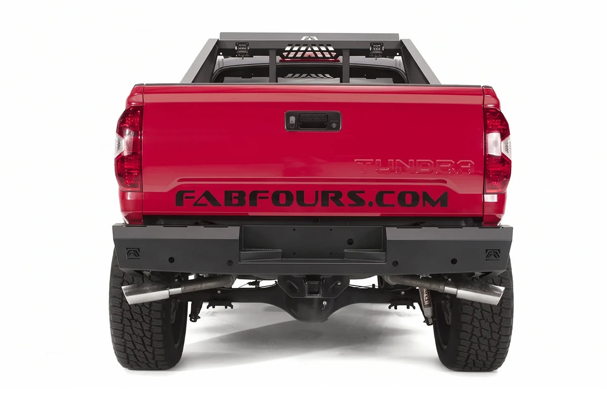 Fab Fours Red Steel rear bumper and bed chase rack on a red Toyota Tundra