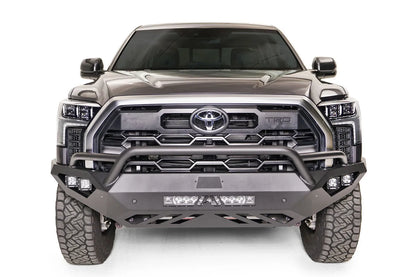 Fab Fours Vengeance front bumper with pre-runner guard on a gray Toyota Tundra, straight-on front view, showing the pre-runner hoop, LED light bar, and cube light pods