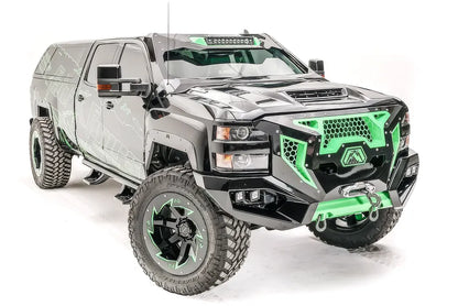 Fab Fours ViCowl on a black and green wrapped Chevrolet Silverado 2500 HD, front three-quarter view, showing the windshield frame cover, integrated light bar, and A-pillar wrap