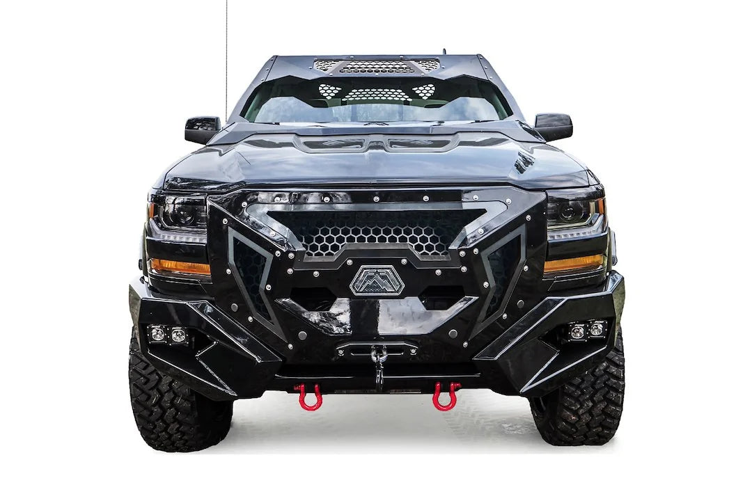 Fab Fours ViCowl on a black Chevrolet Silverado 1500, straight-on front view, showing the windshield frame cover, honeycomb mesh vent, and cowl shape