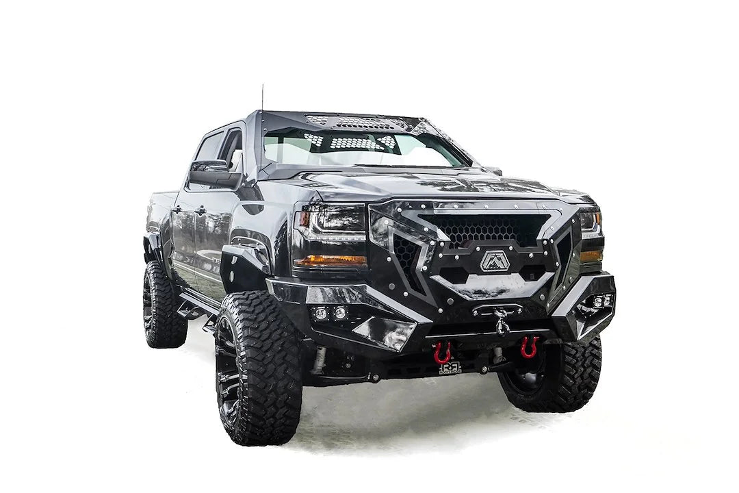 Fab Fours ViCowl on a black Chevrolet Silverado 1500, front three-quarter view, showing the windshield frame cover, mesh vent, and A-pillar wrap