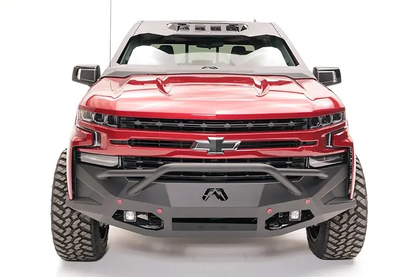 Fab Fours ViCowl on a red Chevrolet Silverado 1500, straight-on front view, showing the windshield frame cover, light pods, and cowl shape