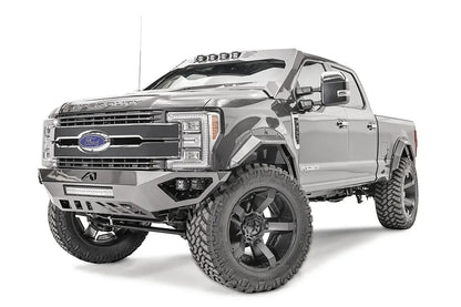Fab Fours ViCowl on a lifted gray Ford Super Duty, front driver-side view, with the angular steel cowl, four cube lights over the windshield and matching Fab Fours front bumper