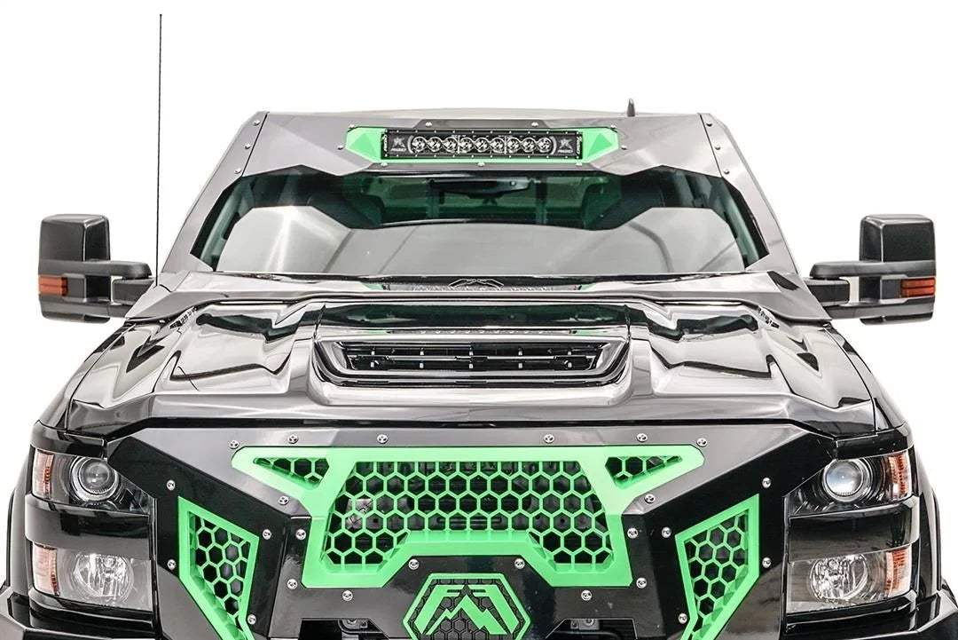 Fab Fours ViCowl 20-inch light bar insert on a black Chevrolet Silverado HD, straight-on front view, showing the light bar centered in the ViCowl frame above a Fab Fours grille